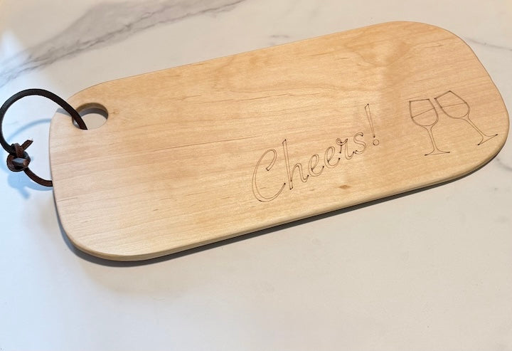 Small Beech Wood Charcuterie Board with engraving of wine glasses and Cheers!